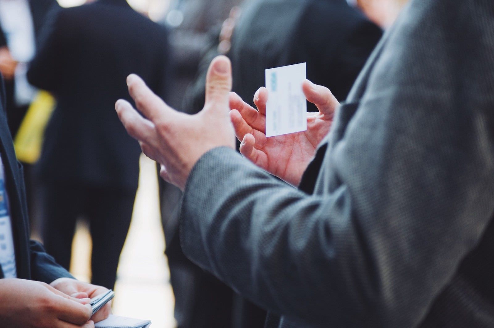 People exchanging business cards